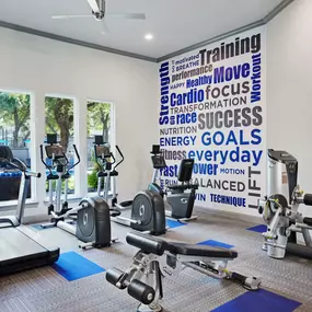 Fitness center with cardio and strength machines