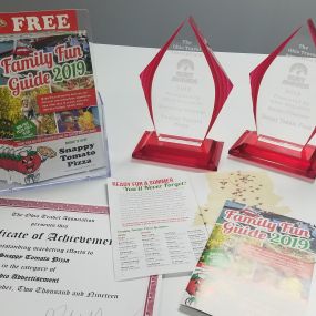 Winning Indiana Tourism Awards for Snappy Tomato Pizza Family Fun Guide - Commercially Printed 16-page booklet featuring area attractions and Snappy Tomato pizzas.