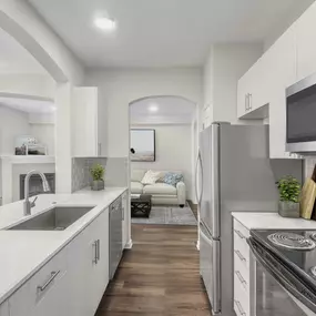 Kitchen with stainless steel appliance