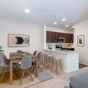 Open concept kitchen, dining and living area at Camden Ashburn Farm in Ashburn, Virginia