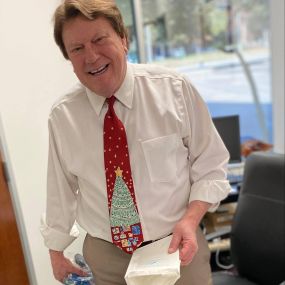 Dr, Jack Bodie, DDS show his holiday spirit with a special Christmas tie