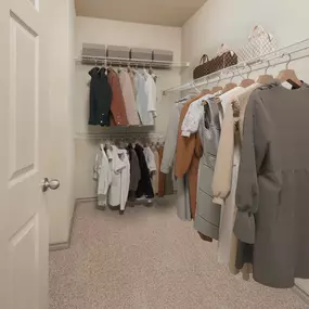 Walk-in closet at Camden Cypress Creek Apartments in Cypress, Tx