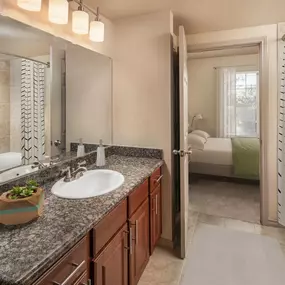 Bathroom with large soaking bathtub and stand up shower at Camden Cypress Creek Apartments in Cypress, Tx