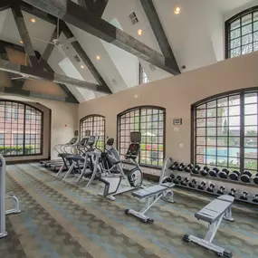 24-hour Fitness Center featuring strength training and cardio equipment at Camden Cypress Creek apartments in Cypress, TX