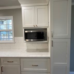Planning your custom design Kitchen means talking with our designer about the details. Where the microwave goes is just one of many details handled during the planning phase.
