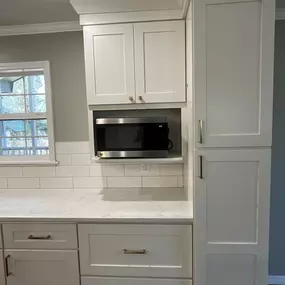 Planning your custom design Kitchen means talking with our designer about the details. Where the microwave goes is just one of many details handled during the planning phase.