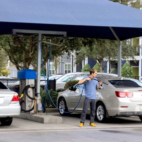 Clean and vacuum your vehicle at our car care center.