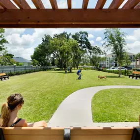 Large dog park with seating area