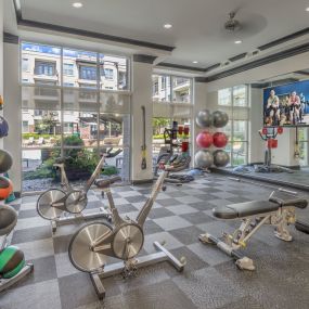 24 hour fitness center with yoga and spin zone