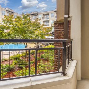 Private apartment patio overlooking pool at Camden Southline