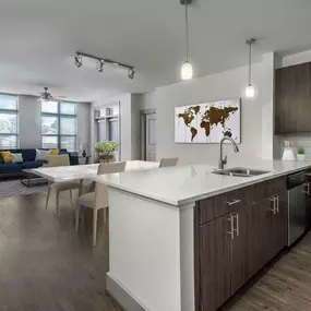 Kitchen overlooking dining and living room