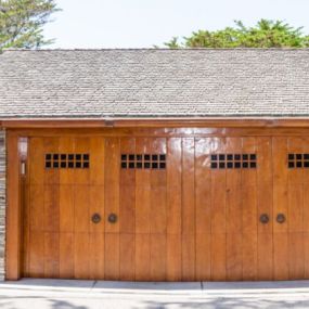 Wondering if you need to replace your wooden Garage door GP Construction Can Help!