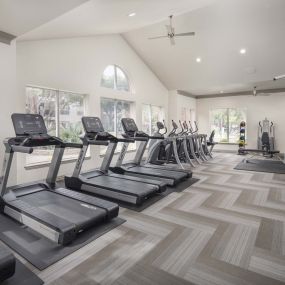 24-hour fitness center with cardio machines at Camden Buckingham apartments in Richardson, TX