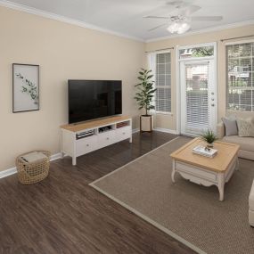 First-floor apartment home with wood-style floors at Camden Buckingham apartments in Richardson, Tx