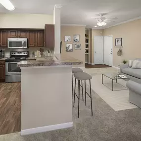 Kitchen and spacious living room at Camden Buckingham apartments in Richardson, Tx