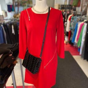 ❤️ Who wears red for Valentine’s Day? This dress would look amazing with tall black boots. A modern look from Joseph Ribkoff.