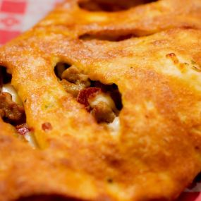 Snappy Tomato Pizza Calzone - Burlington, Kentucky - Call 859.586-9090 - Online Menu - Carryout and Delivery