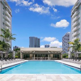 Pool with expansive pool deck at Camden Brickell apartments in Brickell, FL