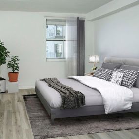 Large bedroom with natural light at Camden Brickell Apartments in Miami, FL.