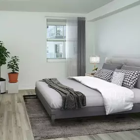 Large bedroom with natural light at Camden Brickell Apartments in Miami, FL.