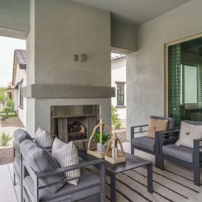 Fairways in Victory at Verrado - Sawgrass Model Home - Outdoor Living Space FIreplace