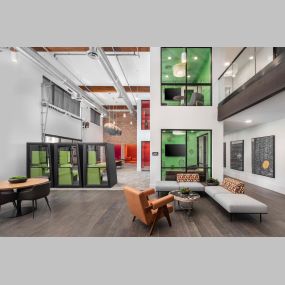 Camden Tempe West Apartments in Tempe Arizona community workspace with community seating, noise proof work pods and private conference rooms