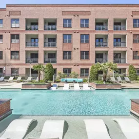 Pool with sun deck at Camden Travis Street Apartments in Midtown Houston, Tx