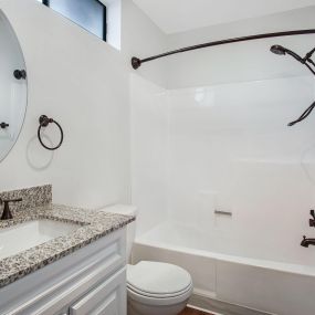 Renovated Bathrooms with Quartz Counters