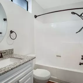 Renovated Bathrooms with Quartz Counters