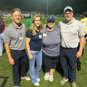 Bone and Joint Institute of Tennessee staff assisting with on-field athletic training