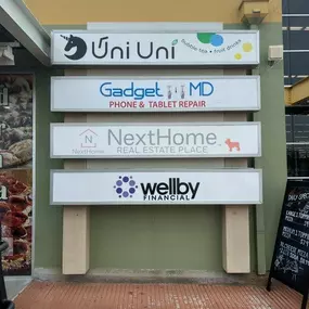 Wellby Financial signage inside of HEB in Katy