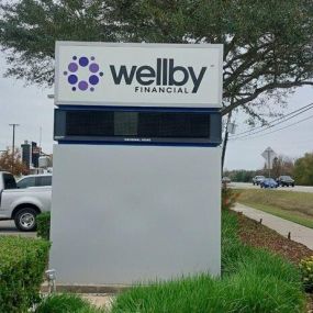 Exterior signage of Wellby Financial in Pearland