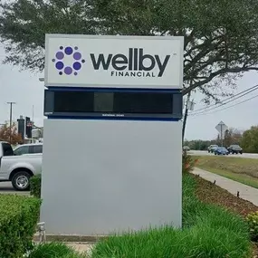 Exterior signage of Wellby Financial in Pearland