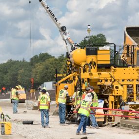 team member working on I-96 concrete construction