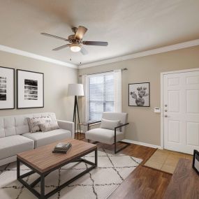 First floor living room with wood-style flooring at Camden Shadow Brook in Austin, TX