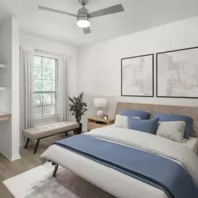 Renovated bedroom with ceiling fan and built-in desk at Camden Shadow Brook apartments in Austin, TX