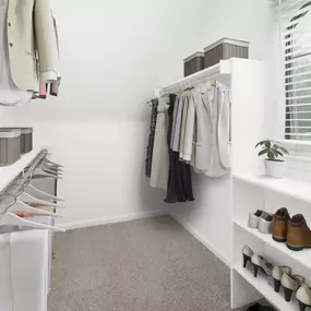 Spacious closet with window and built-in wood shelves at Camden Shadow Brook apartments in Austin, TX