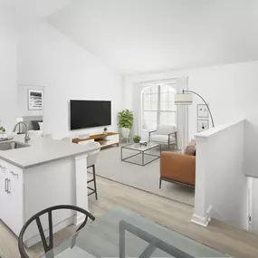 Top floor living room and kitchen with private staircase entry at Camden Shadow Brook apartments in Austin, TX