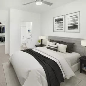 Bedroom with ensuite bathroom and walk-in closet at Camden Shadow Brook apartments in Austin, TX