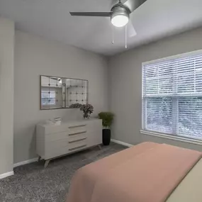 Bedroom with ceiling fan and carpet flooring