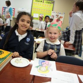 At Ave Maria Academy, we schedule times for older students to work with younger students.