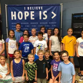 Student volunteers at Feed My Starving Children. Caring for our less fortunate is an important principle we teach at Ave Maria Academy.