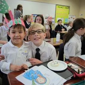 Students at Ave Maria Academy enjoying their activity and treats!