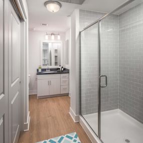 Bathroom with stand up shower and closet