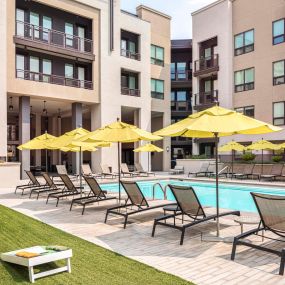 Swimming pool with lounge chairs and outdoor games