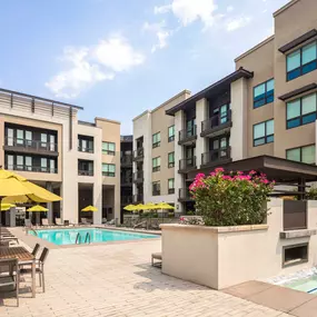 Swimming pool and spa with outdoor dining area