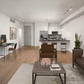 Living room looking towards kitchen with desk area