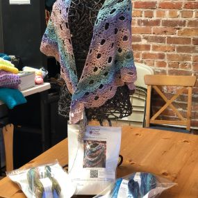 Hello crocheters!!! We have a virus shawl pattern with some lovely Lang Paradise yarn kits. Come on down to the Shoppe or order yours today!