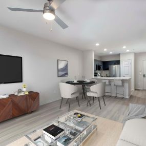 Living and dining room with wood look flooring ceiling fan and overhead light