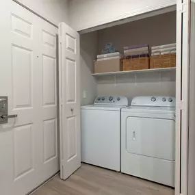 Laundry area with full size washer and dryer